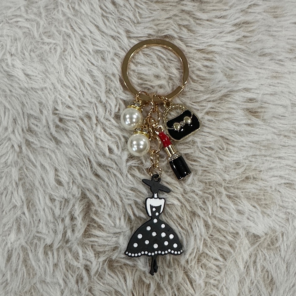 Elegant Black and Gold bag charm with Dress Charm